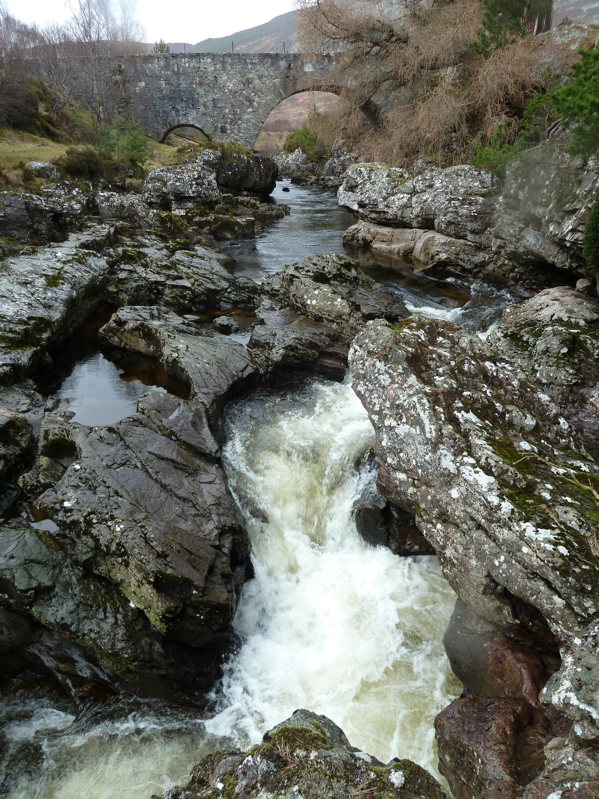 Water rushing through the rocky Falls of Truim