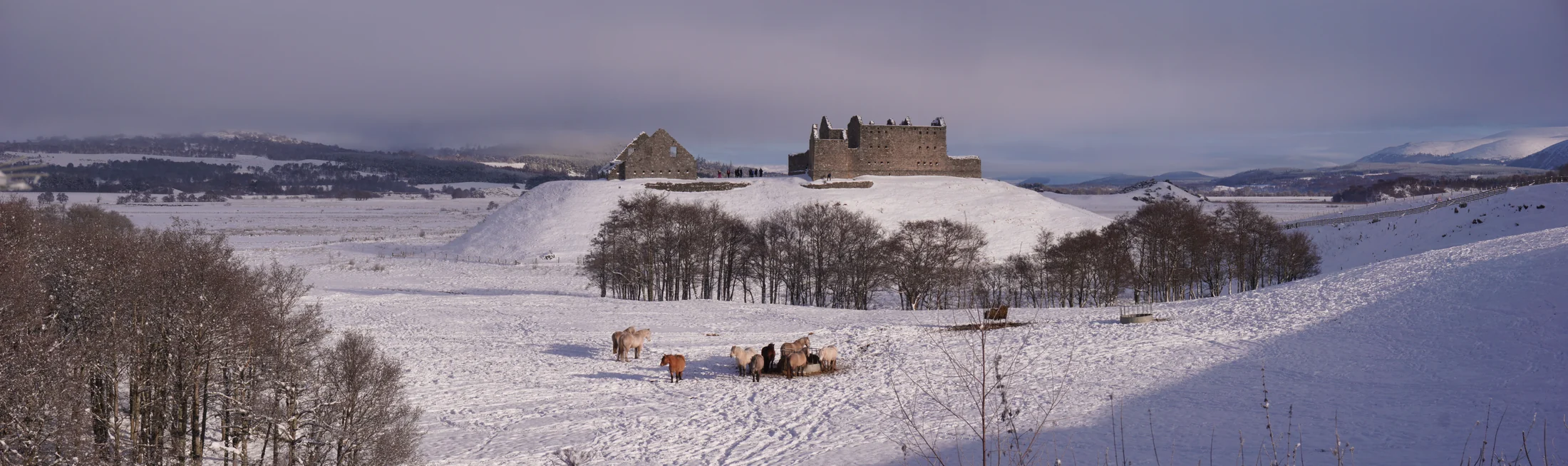 Ruthven Barracks above the snowy Badenoch landscape