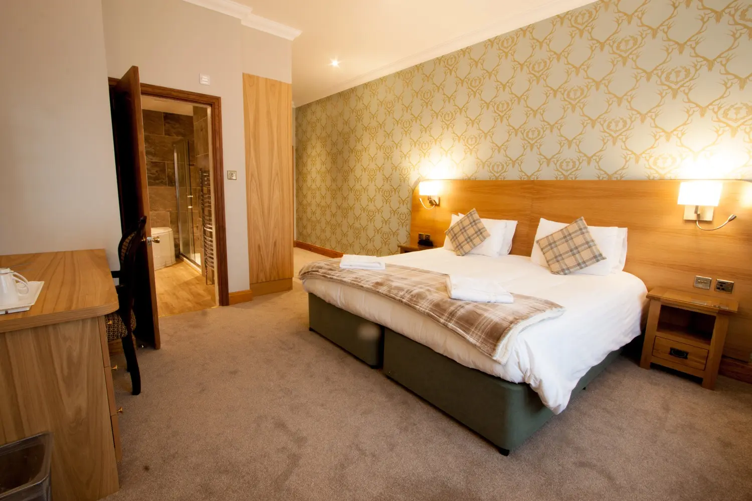 A comfortable bedroom at the Duke of Gordon Hotel